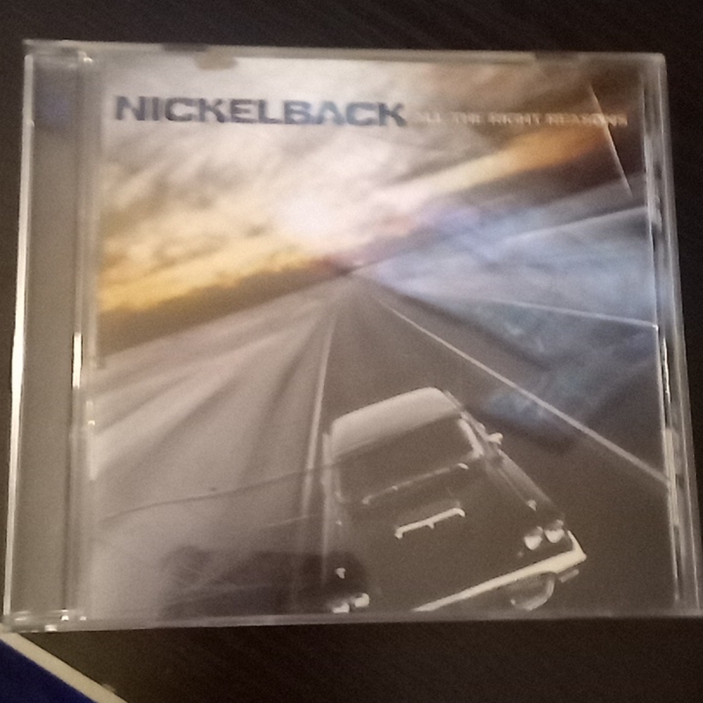 Nickleback All the right reasons cd. (Crack on  front x2)